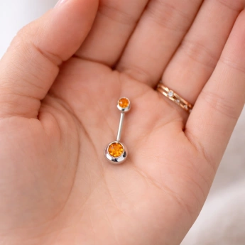 Ocelový piercing do pupíku oranžový zirkon