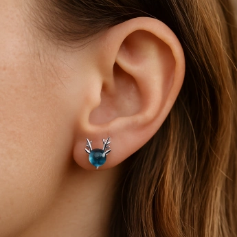 Stříbrné náušnice s modrým zirkonem sobíci Vortex